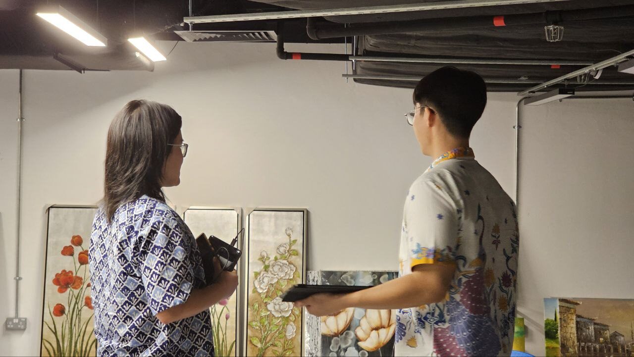 Scouting the exhibition space at The Centrepoint Orchard